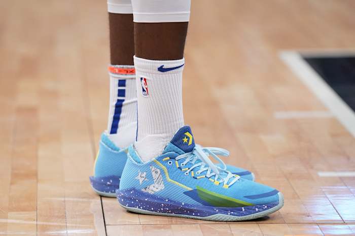 View of Draymond Green's blue Converse shoes.